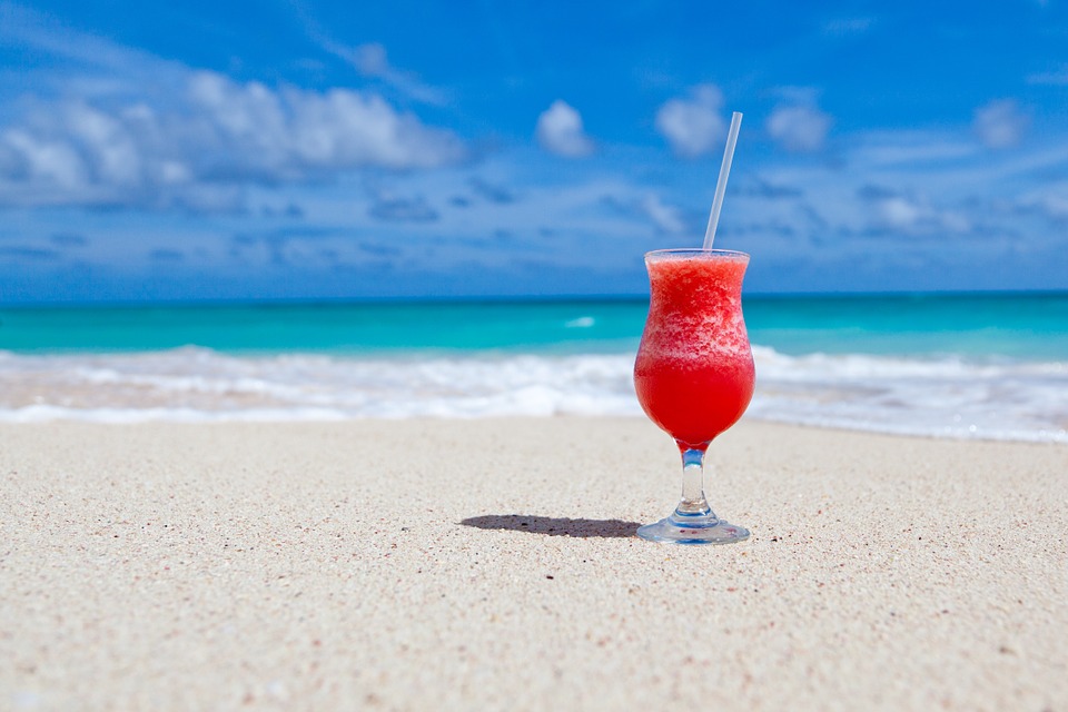 drinking cocktails on the beach while thinking about learning French in September